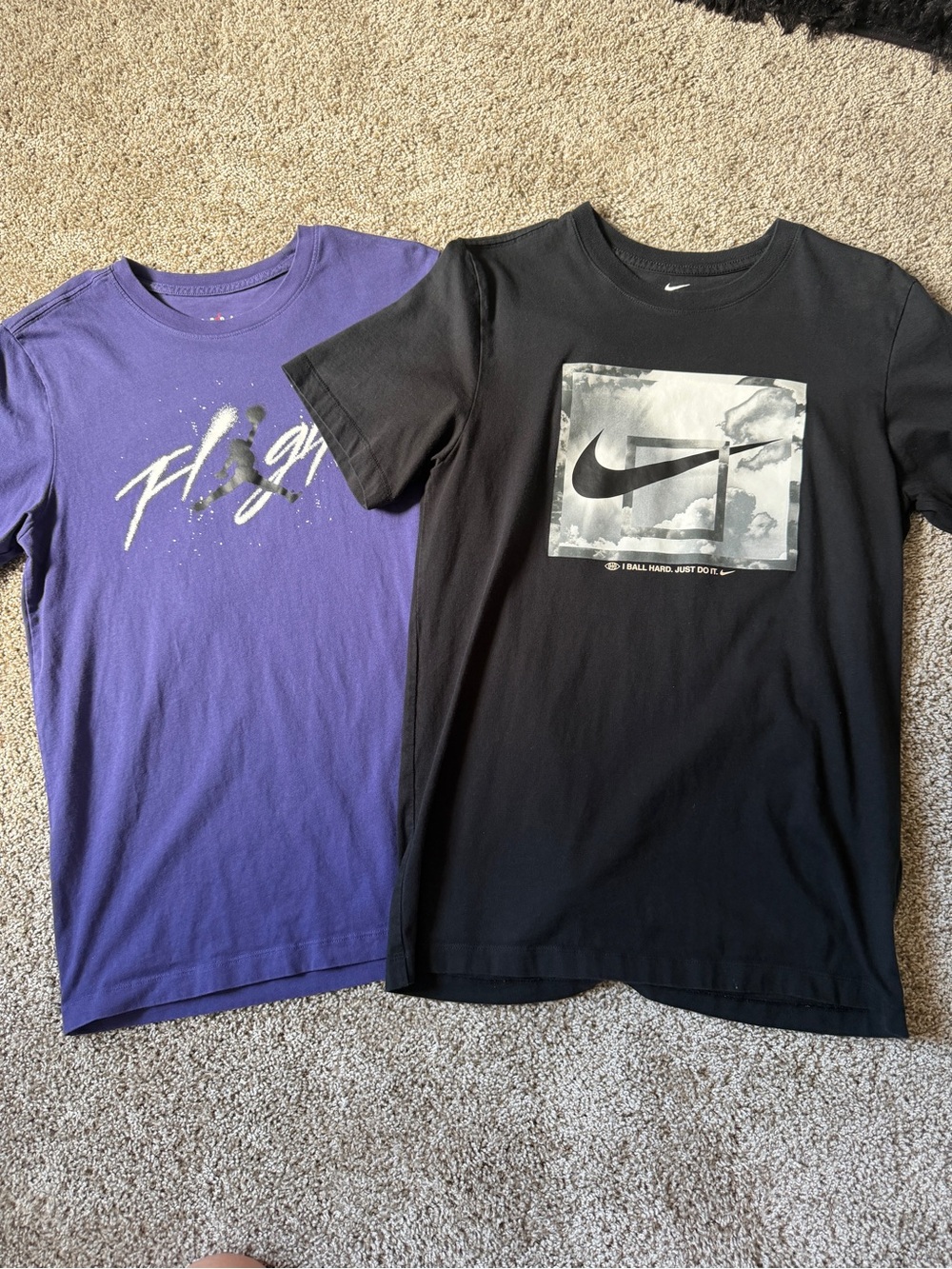 1 Nike T & 1 Jordan T both like new